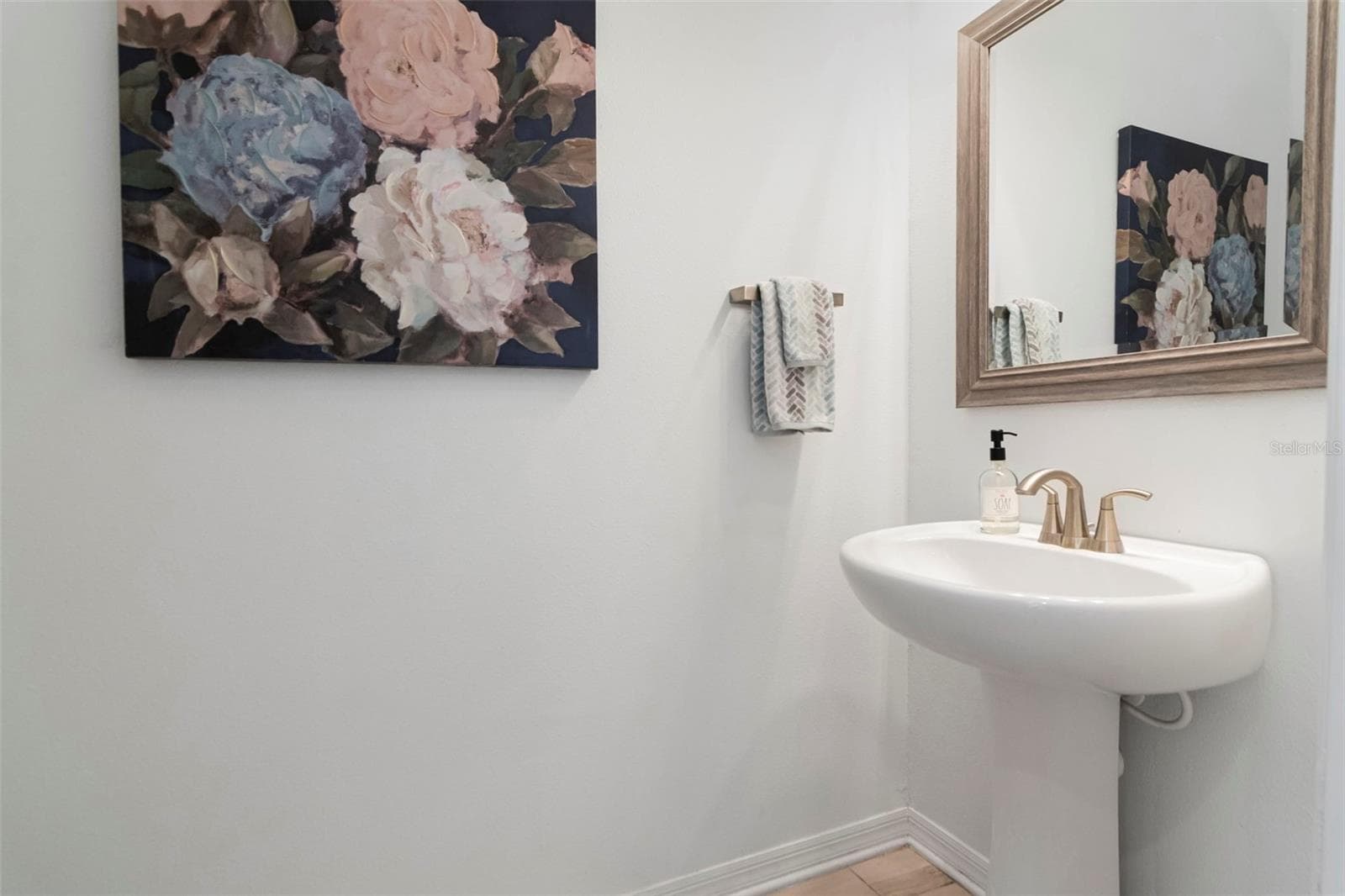 Convenient half bath on the main floor. - 2455 GOLDEN PASTURE CIR, CLEARWATER