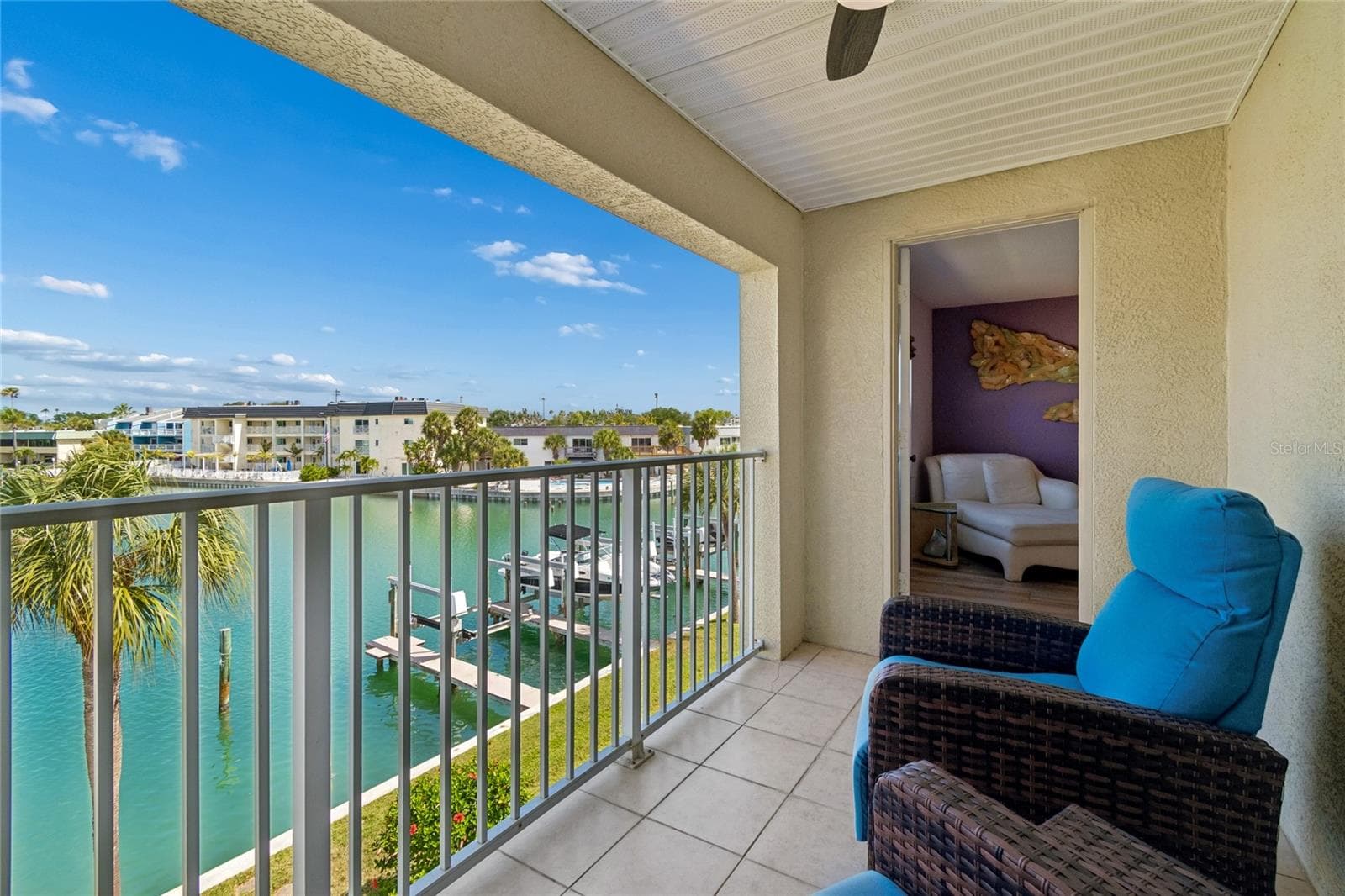A balcony on every floor. This one is perfect for a morning coffee next to the primary suite. - 152 117TH AVE, TREASURE ISLAND
