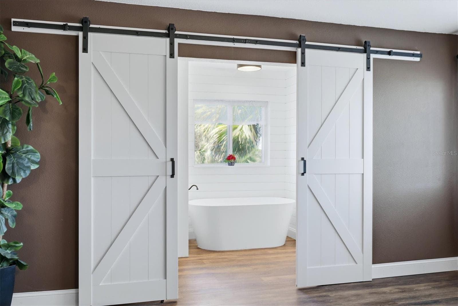 Enter the sumptuous primary bath... - 90 OAKLAND HILLS CT, ROTONDA WEST