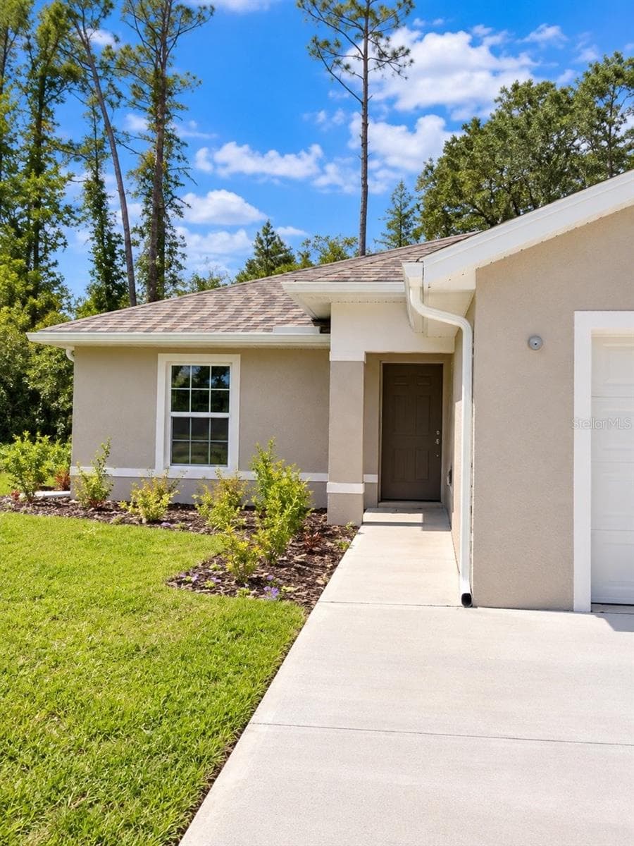 Duplex at 91 PLAIN VIEW DR, PALM COAST, photo 3 of 16