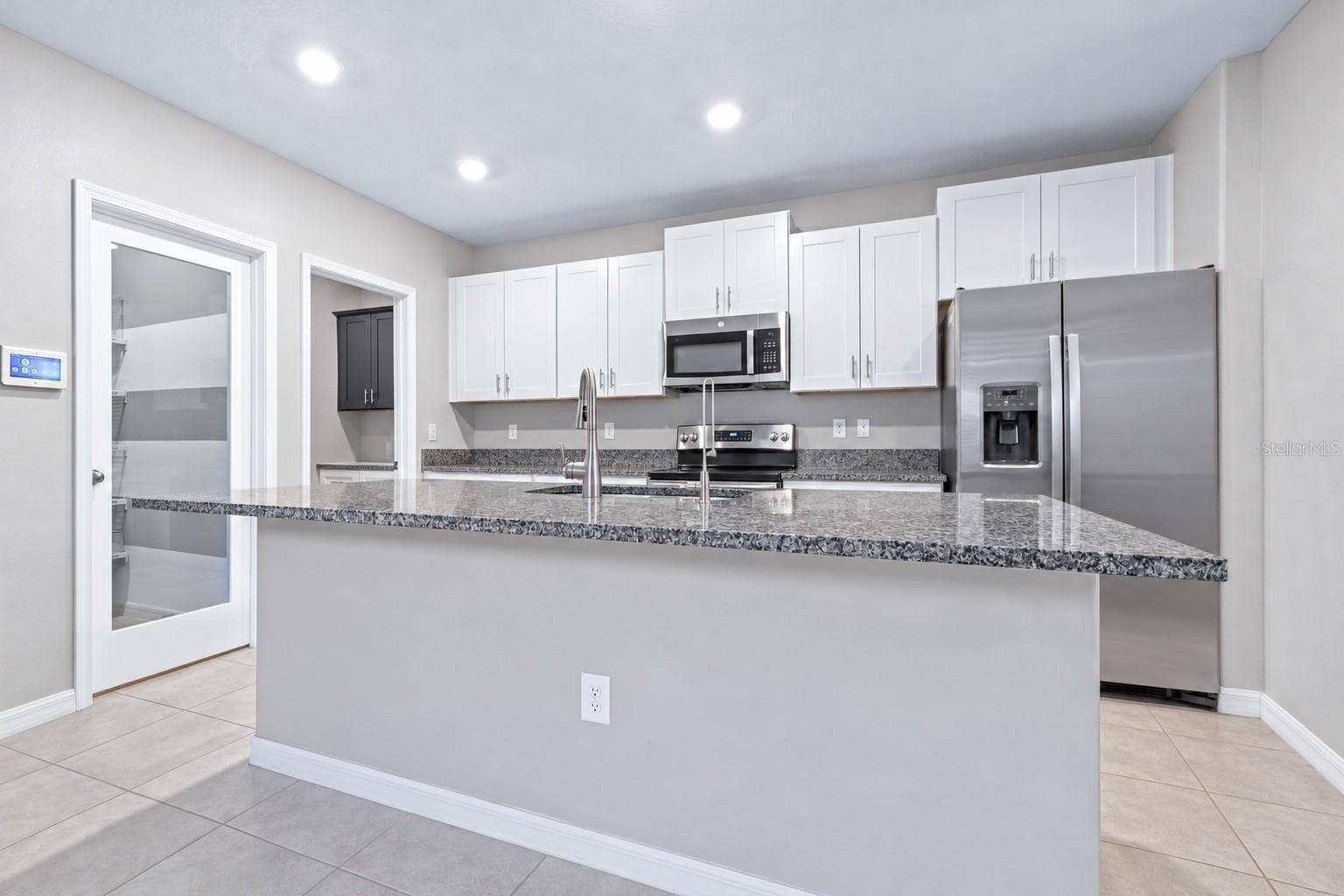 Kitchen with walk in pantry - 16755 DELIA ST, WIMAUMA