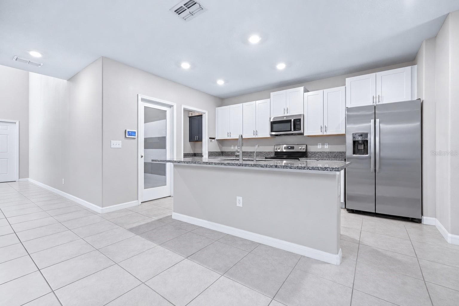 Kitchen with walk in pantry - 16755 DELIA ST, WIMAUMA