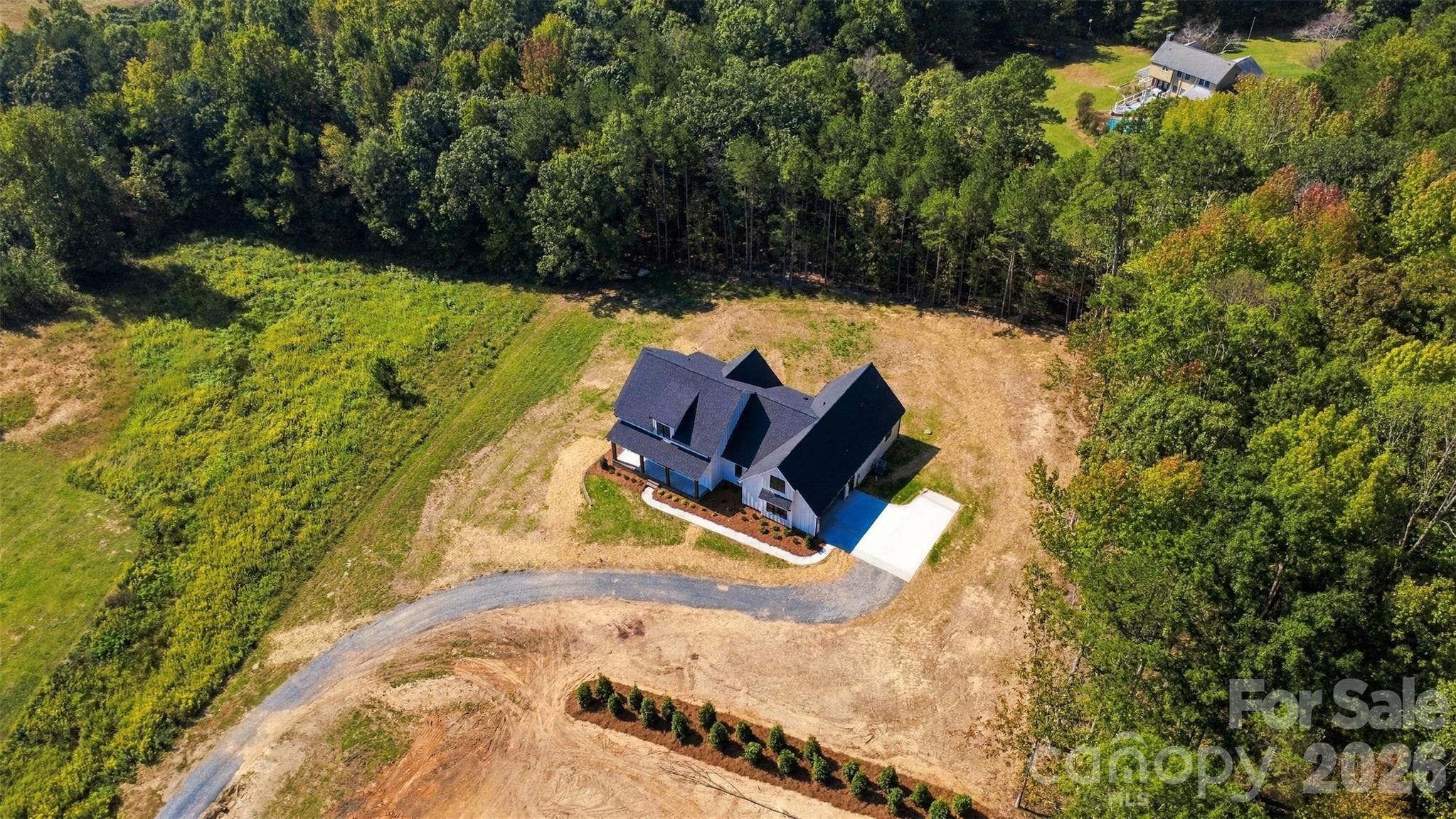 Private, level one acre lot- driveway will be paved asphalt to the concrete pad soon! - 394 S NC 200 Highway, Stanfield