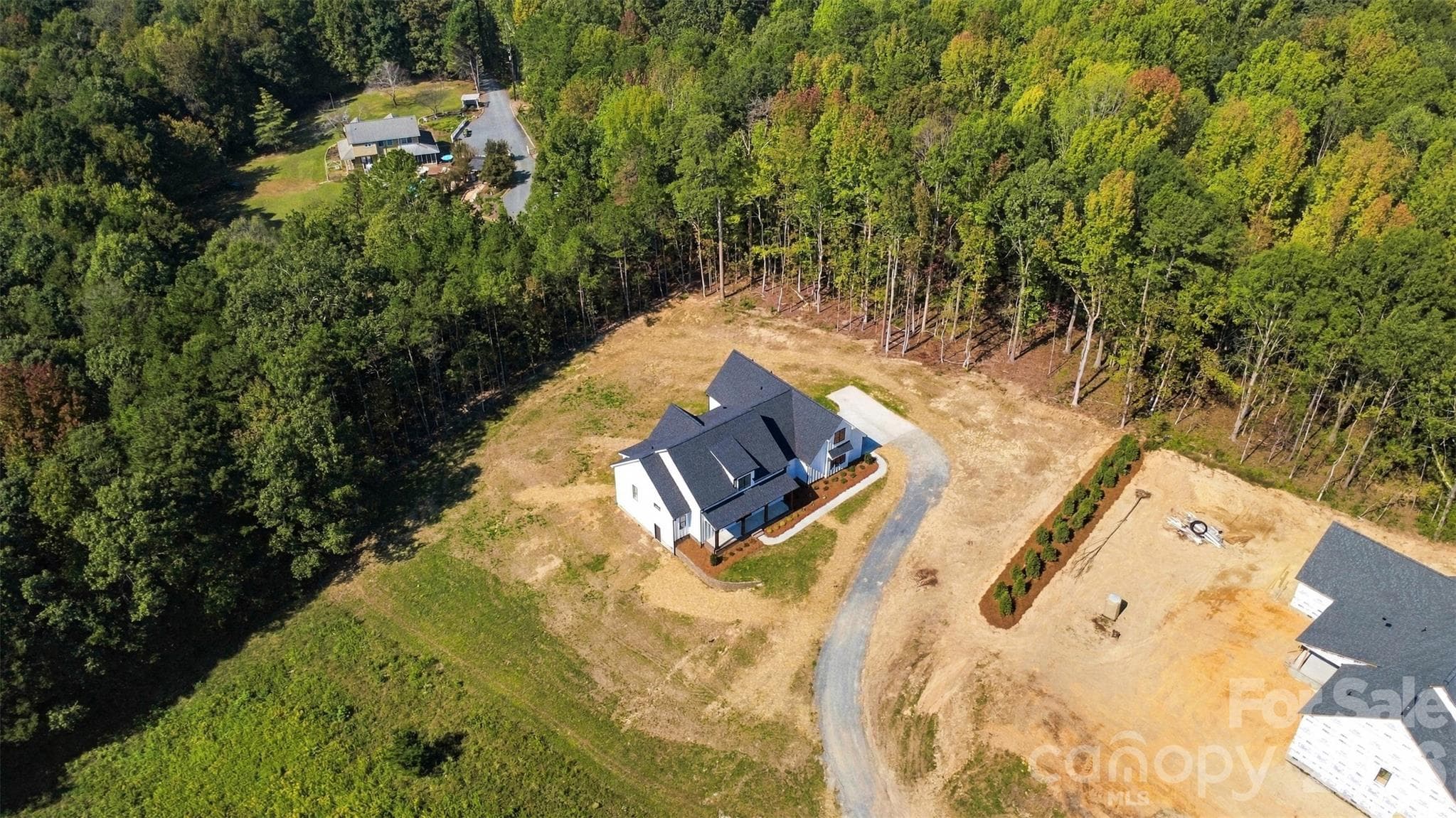Private, level one acre lot- driveway will be paved asphalt to the concrete pad soon! - 394 S NC 200 Highway, Stanfield