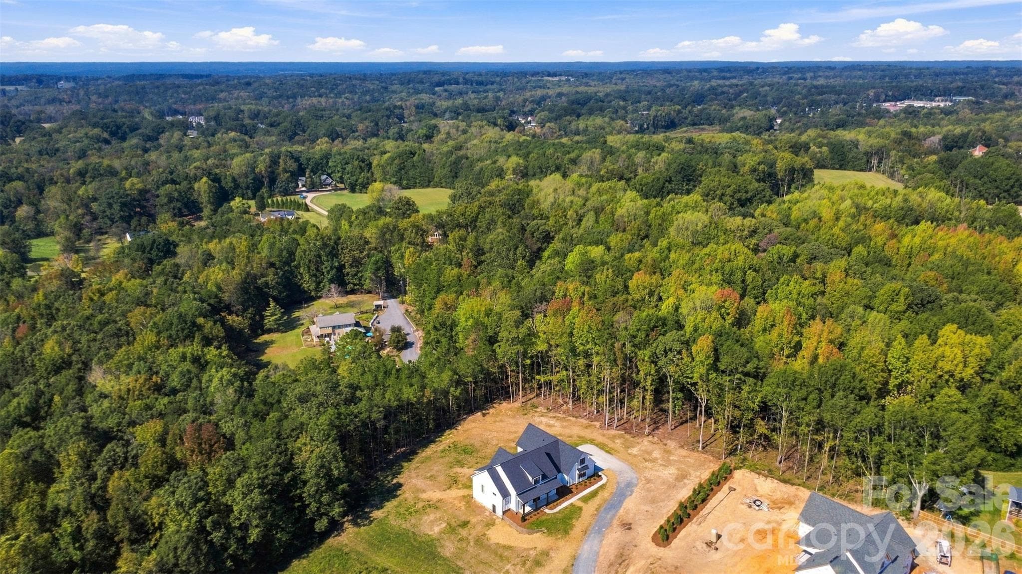 Private, level one acre lot- driveway will be paved asphalt to the concrete pad soon! - 394 S NC 200 Highway, Stanfield