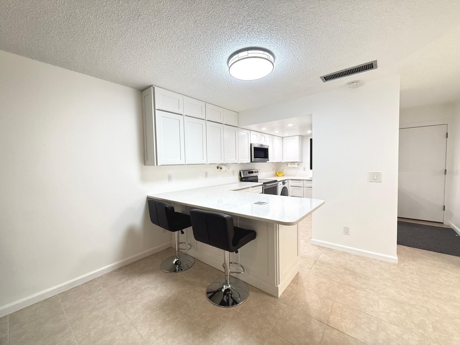 UPDATED to PERFECTION - 215 VALENCIA BLVD #107, BELLEAIR BLUFFS