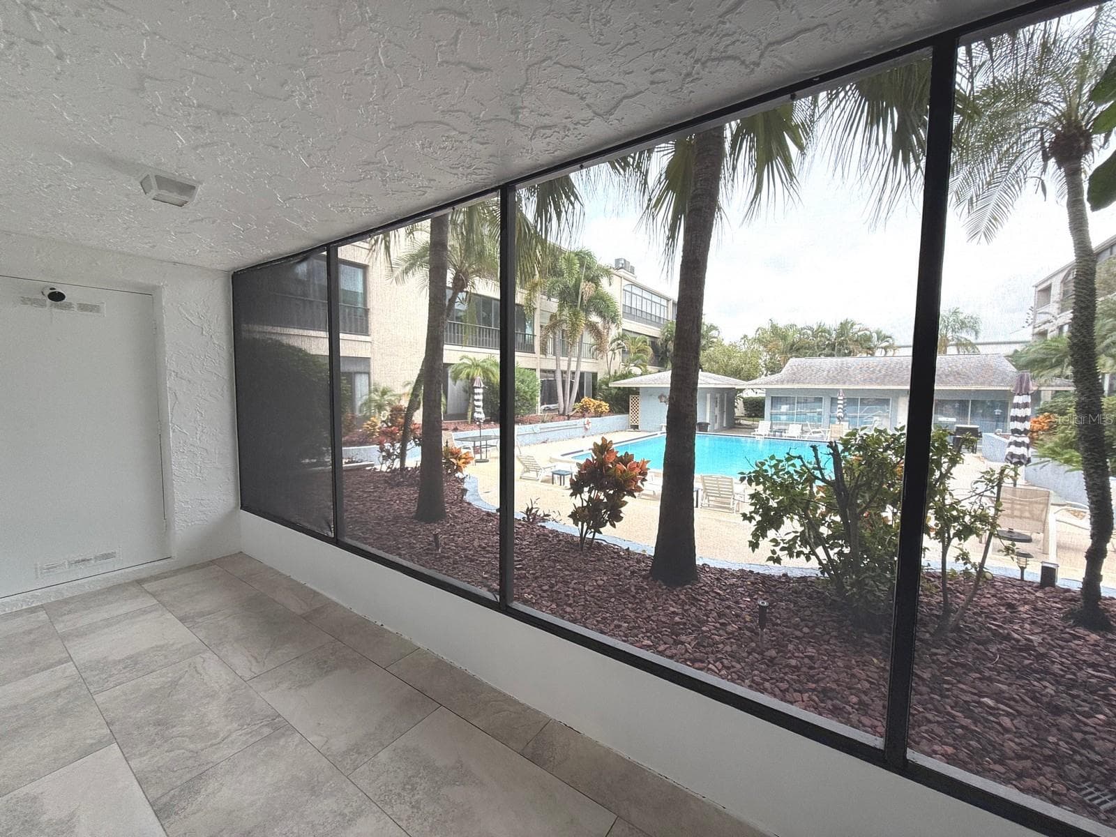 POOL and GARDEN VIEW - 215 VALENCIA BLVD #107, BELLEAIR BLUFFS