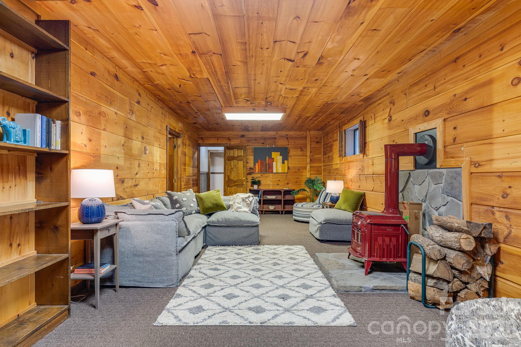 Warm and cozy lower level den has outside access to cover porch and driveway zero entry - 104 Paramount Drive, Leicester