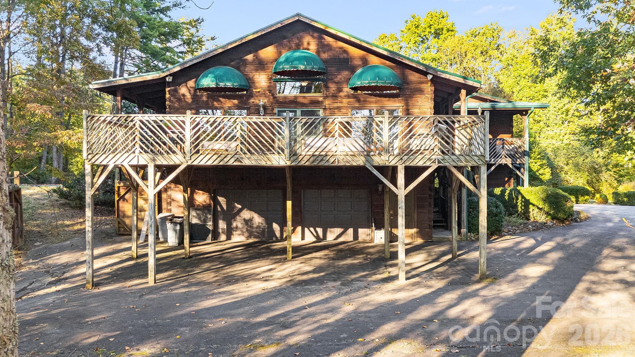 Wraparound Deck and oversized 2 car garage. Tons of driveway parking - 104 Paramount Drive, Leicester