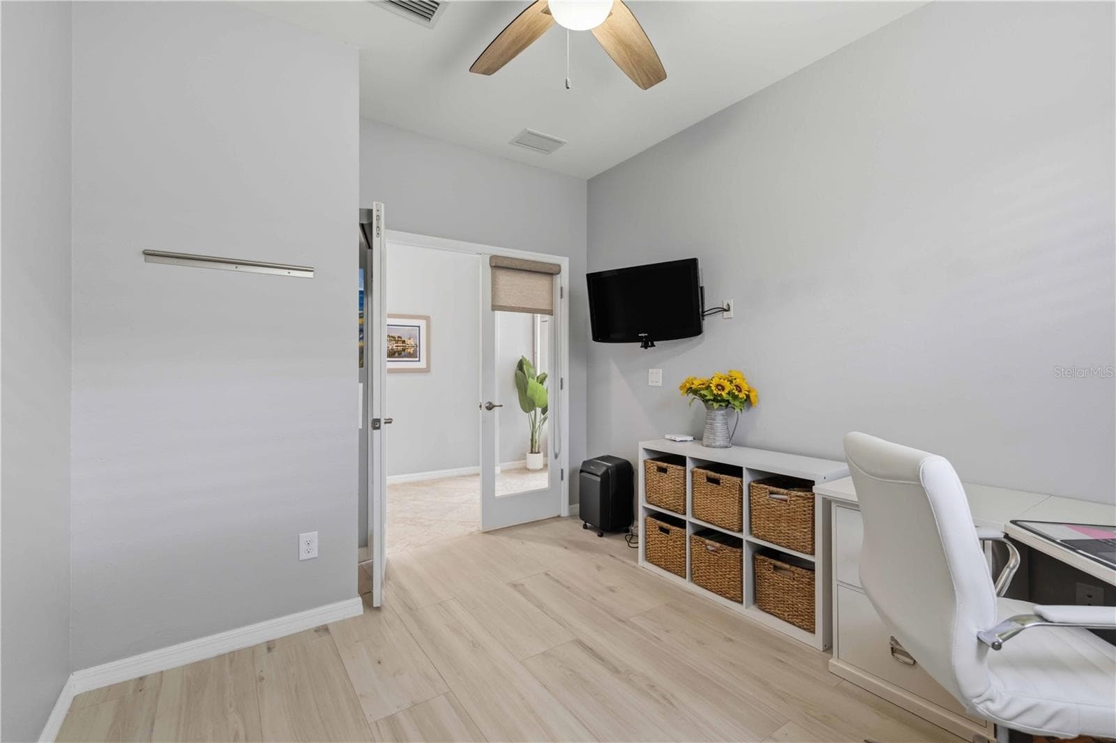 Office looking out to hallway through French Doors with shades (when privacy is needed) - 4523 BALTRY CT, BRADENTON