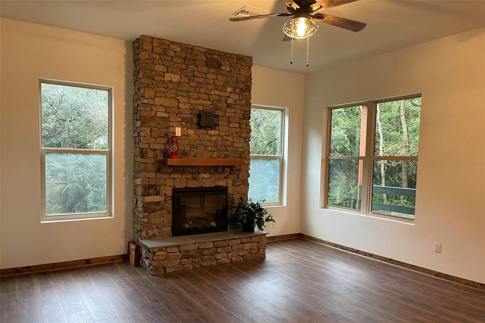 Unit 2 living room fireplace - 31026 NOCATEE TRL, SORRENTO