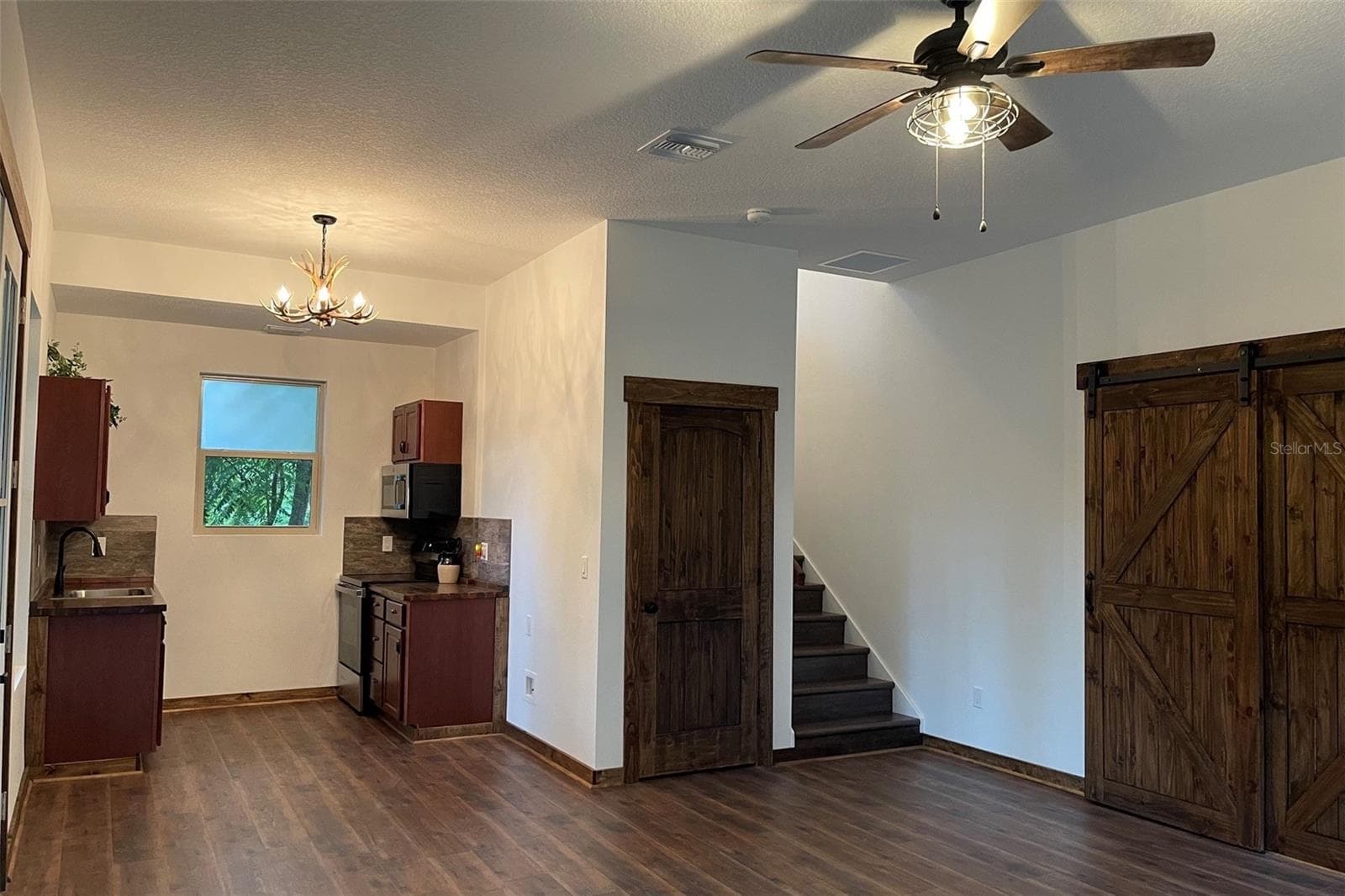 Unit 2 kitchen - 31026 NOCATEE TRL, SORRENTO