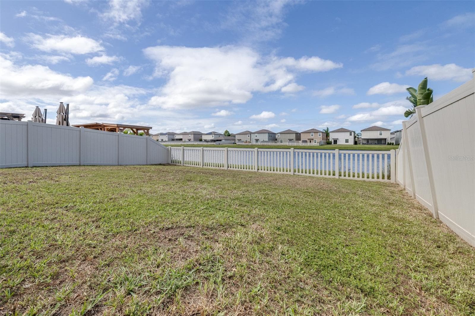 Fully Fenced yard overlooking pond - 16755 DELIA ST, WIMAUMA