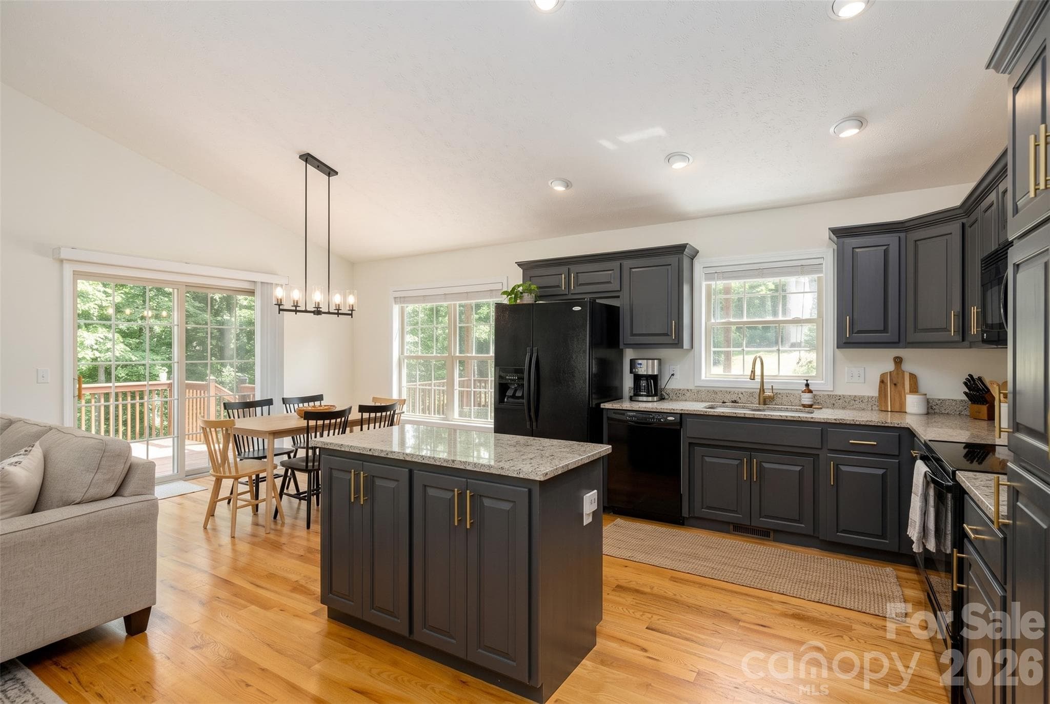 What if you painted the kitchen cabinets?AI generated image of possible interior design. - 59 Smalltown Trail, Brevard