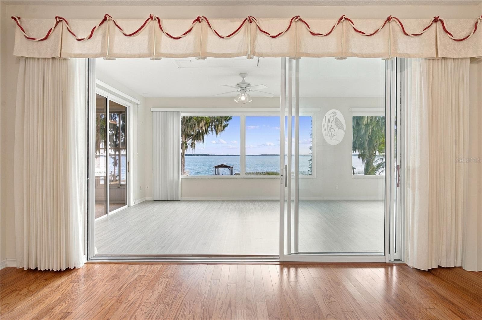 Sliders leading to back Florida room - 6274 SAILBOAT AVE, TAVARES