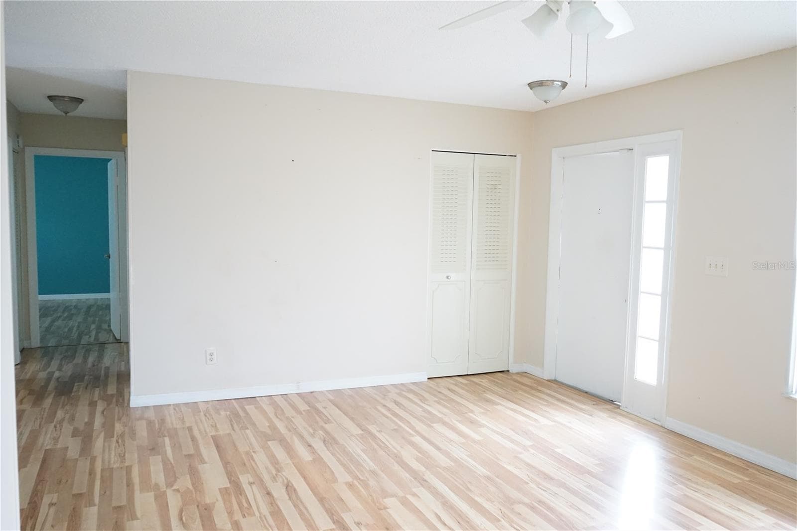 front door and coat closet - 703 HUXLEY PL, SUN CITY CENTER