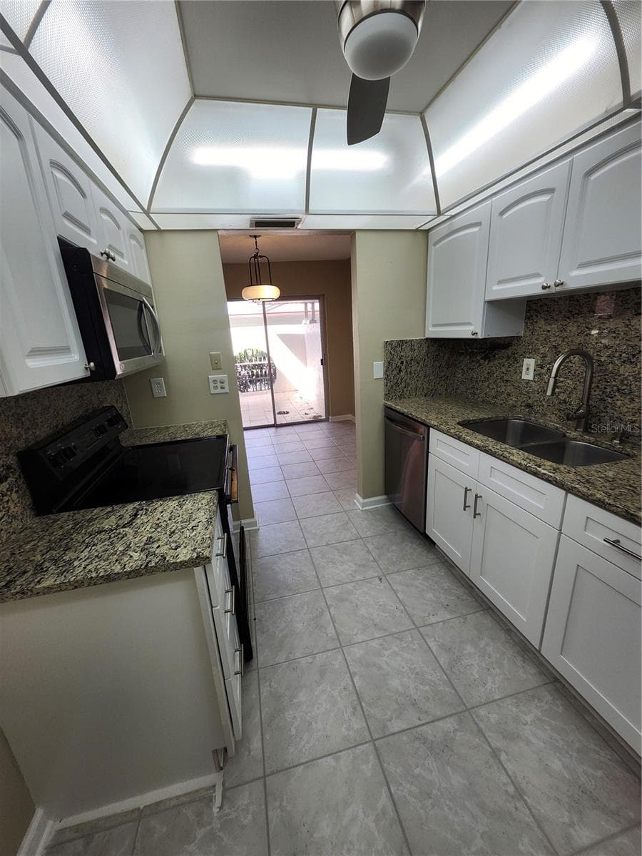 Villa at 1418 14TH CIR SE, LARGO, photo 10 of 27