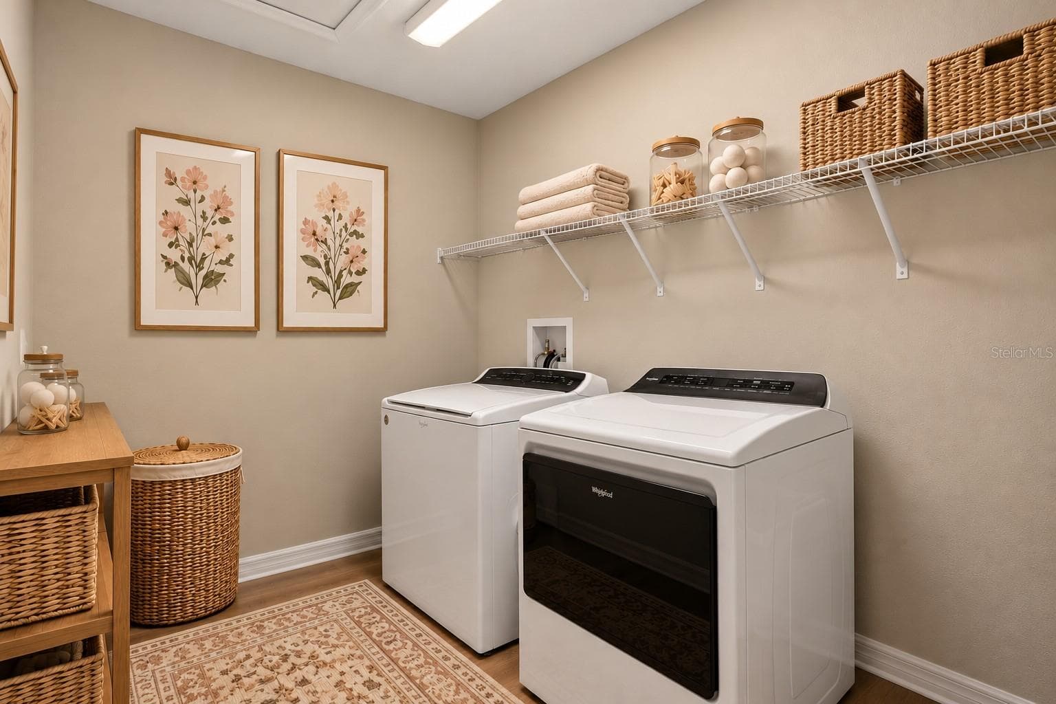 Upstairs laundry room digitally staged - 7580 FREESIA TRCE, WESLEY CHAPEL