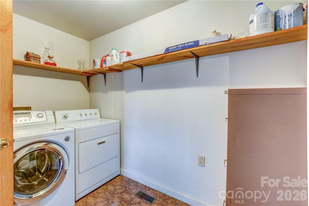 Large Laundry room with overhead shelving - 311 Bell Road, Kings Mountain