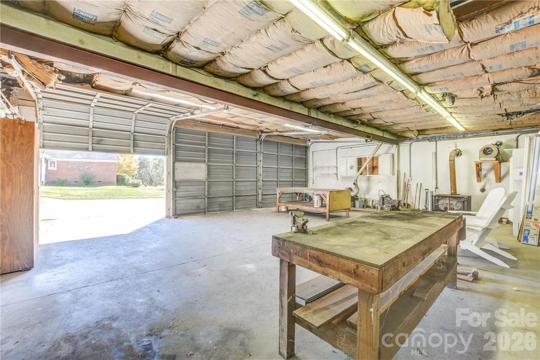 Garage has 3 oversized bay doors - 311 Bell Road, Kings Mountain