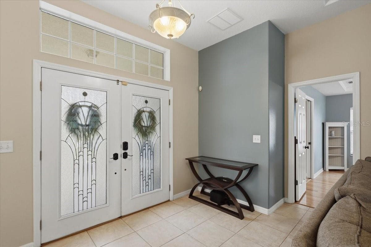 Gorgoeus double front glass doors - 24 LEAVER DR, PALM COAST