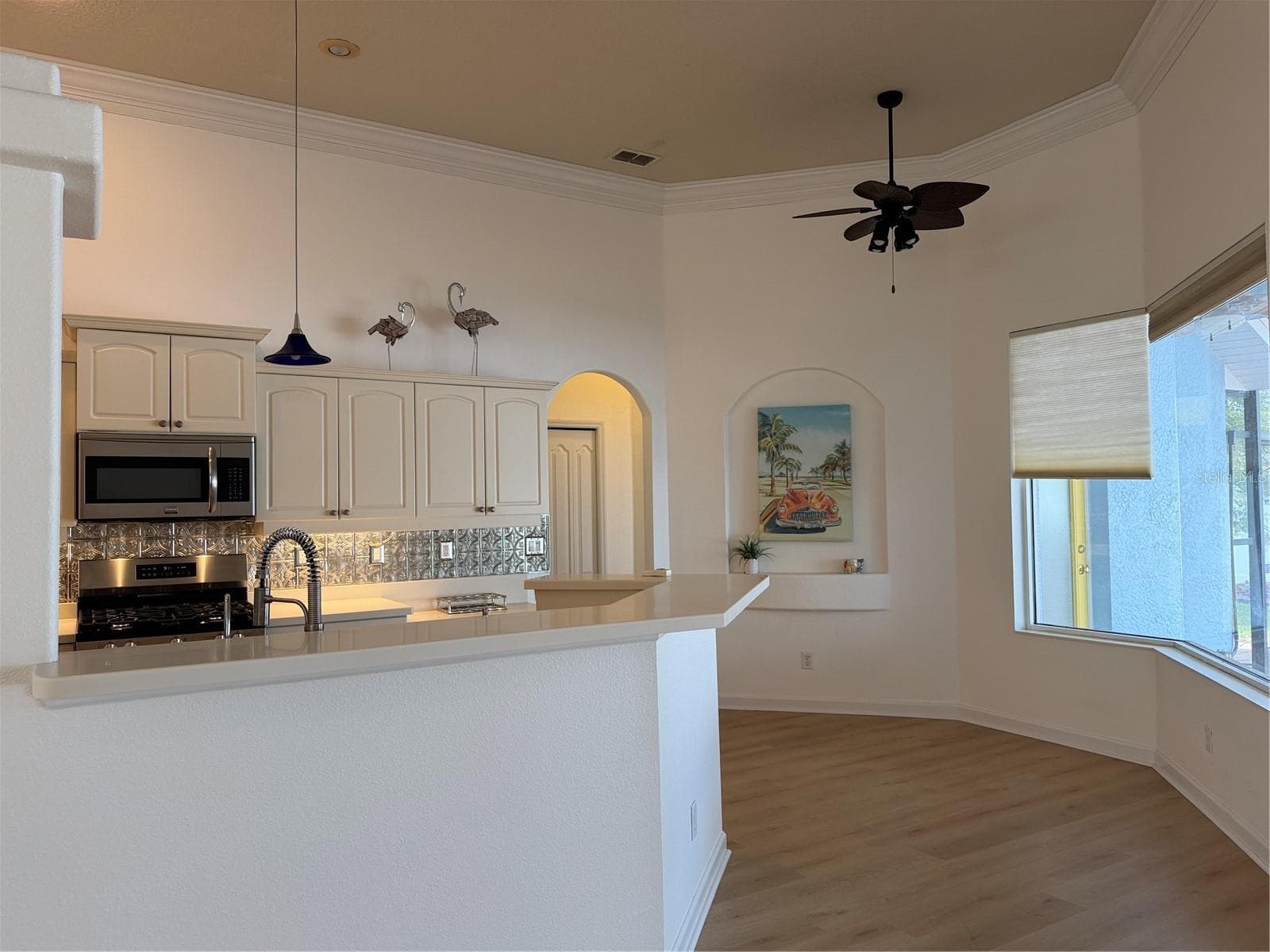Breakfast bar at counter top - 2311 OASIS DR, LAND O LAKES