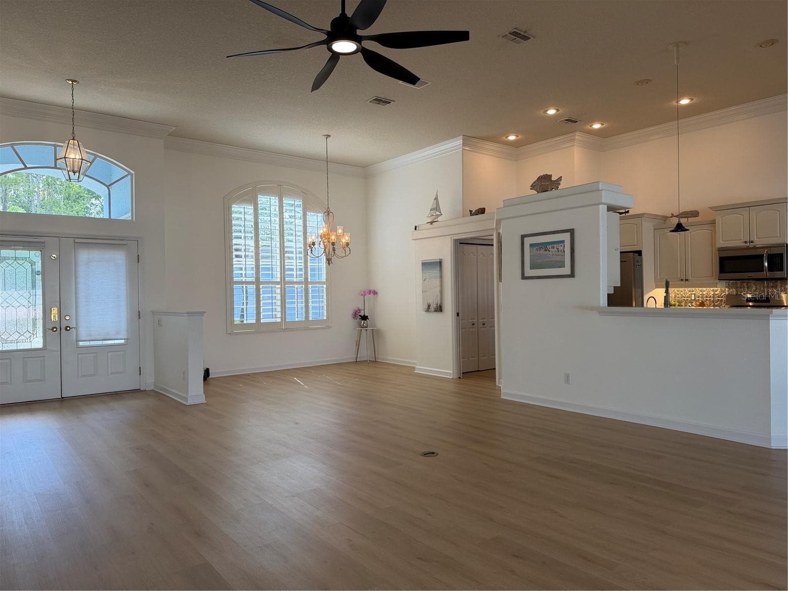 Looking at living area from the primary bedroom - 2311 OASIS DR, LAND O LAKES