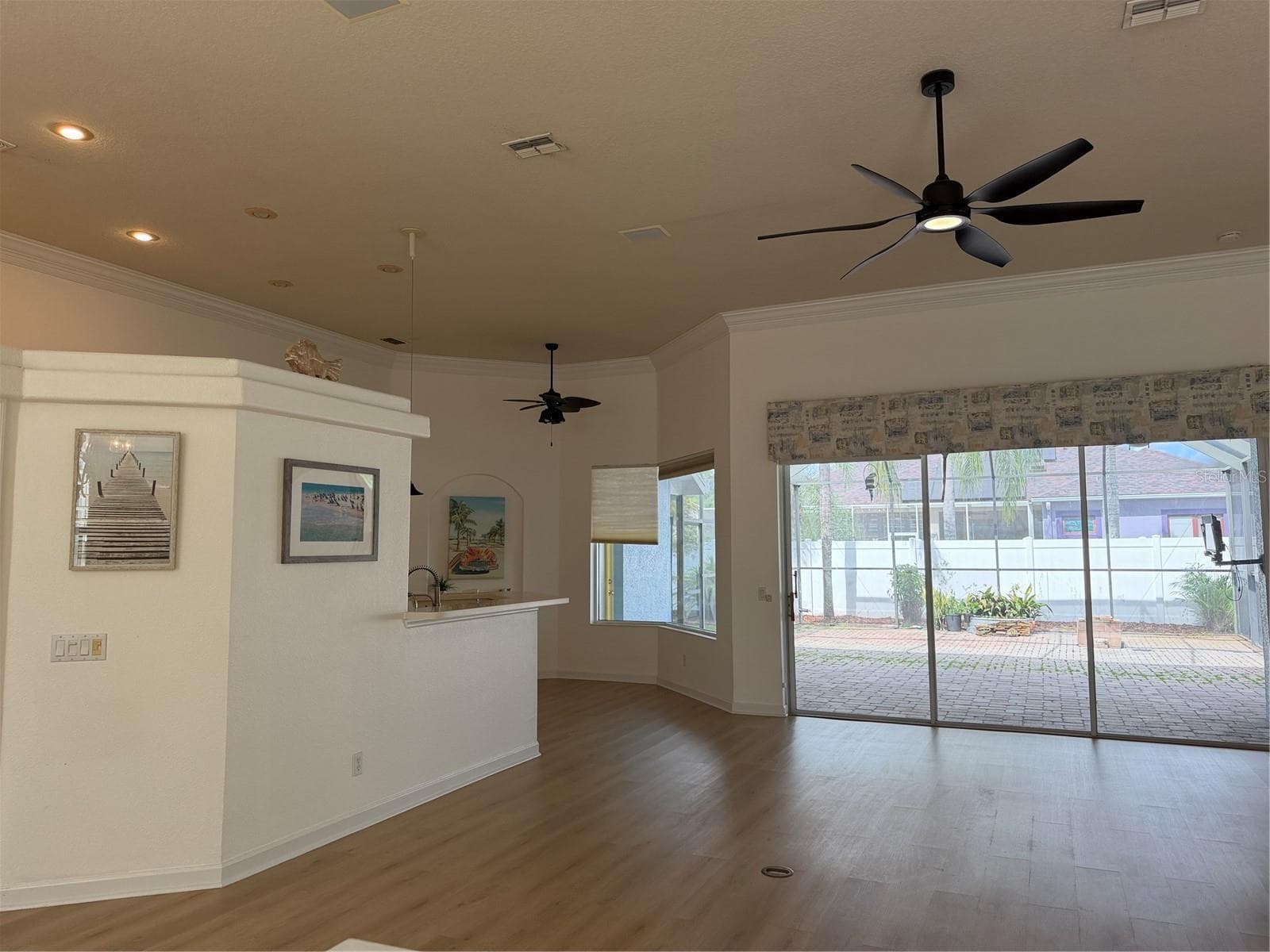Decorative drywall shelving above kitchen wall is great place to showcase novelty items - 2311 OASIS DR, LAND O LAKES