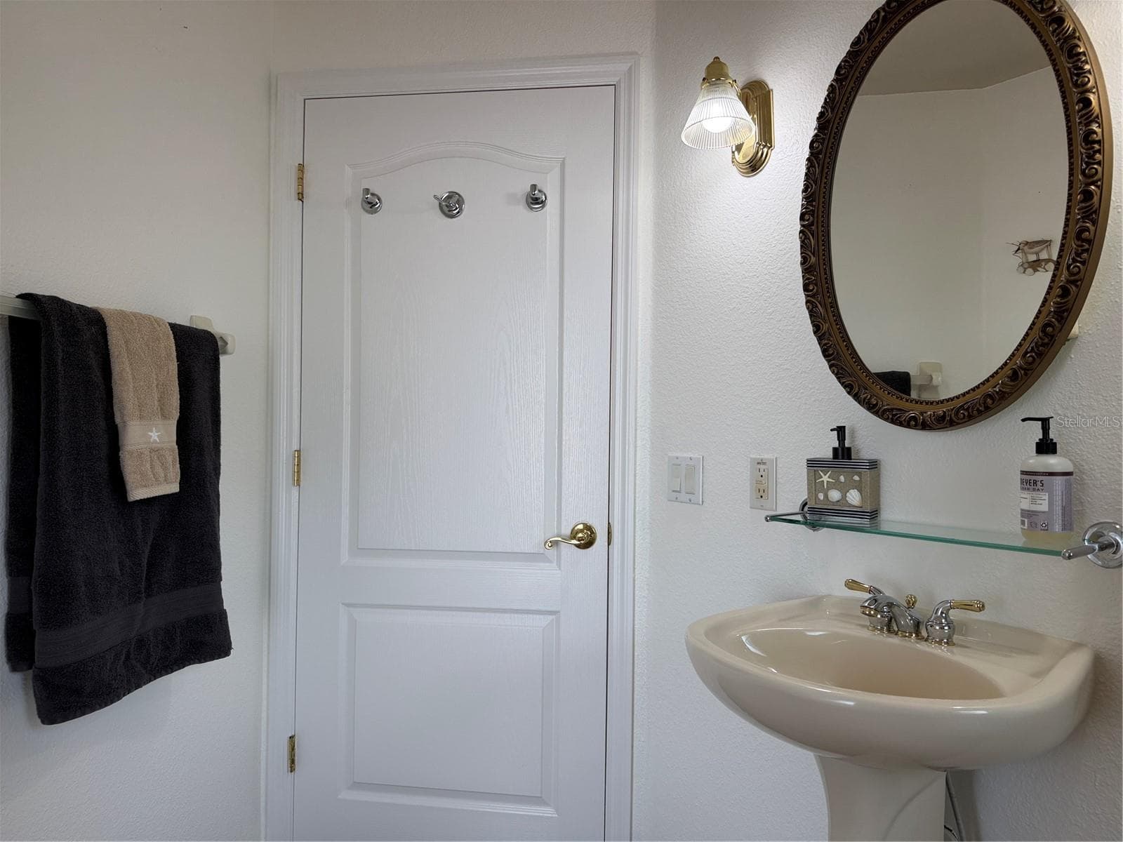 Bathroom is close to kitchen - 2311 OASIS DR, LAND O LAKES