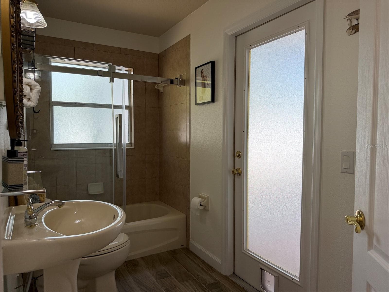 Door leads out to large lanai - 2311 OASIS DR, LAND O LAKES