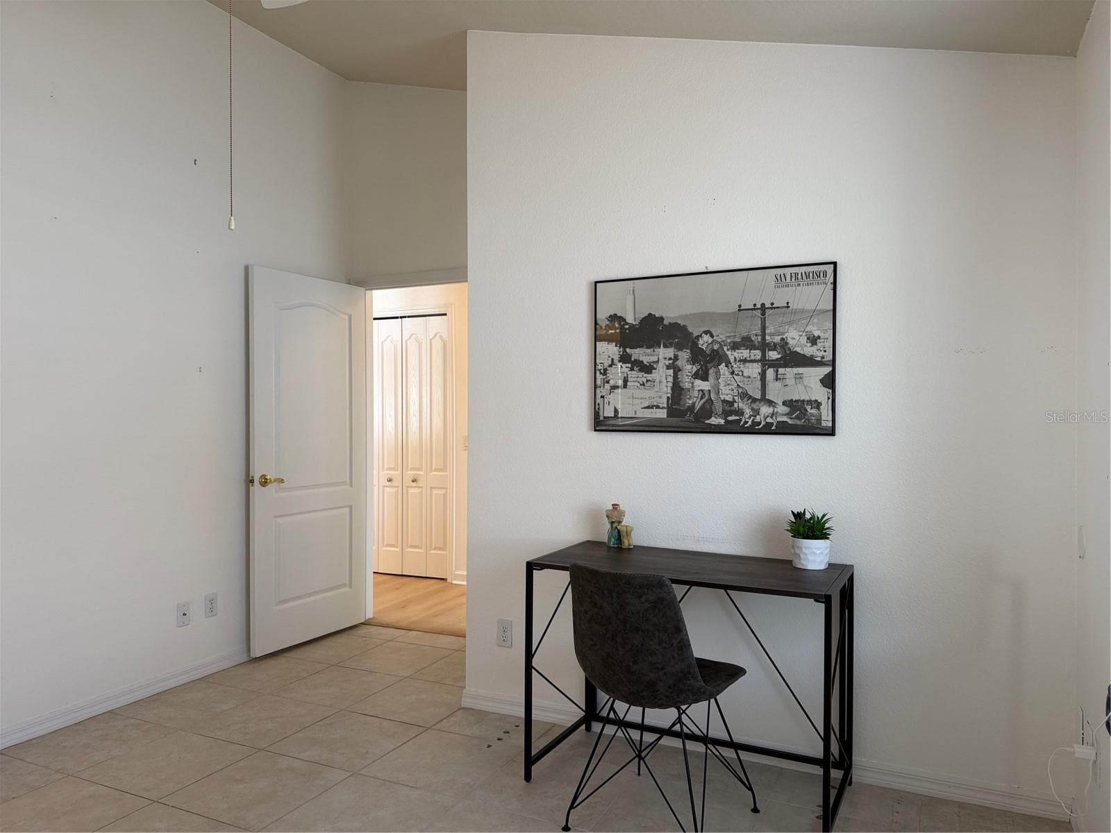 Cathedral ceiling, Door leads to garage, bonus room, laundry, and kitchen - 2311 OASIS DR, LAND O LAKES