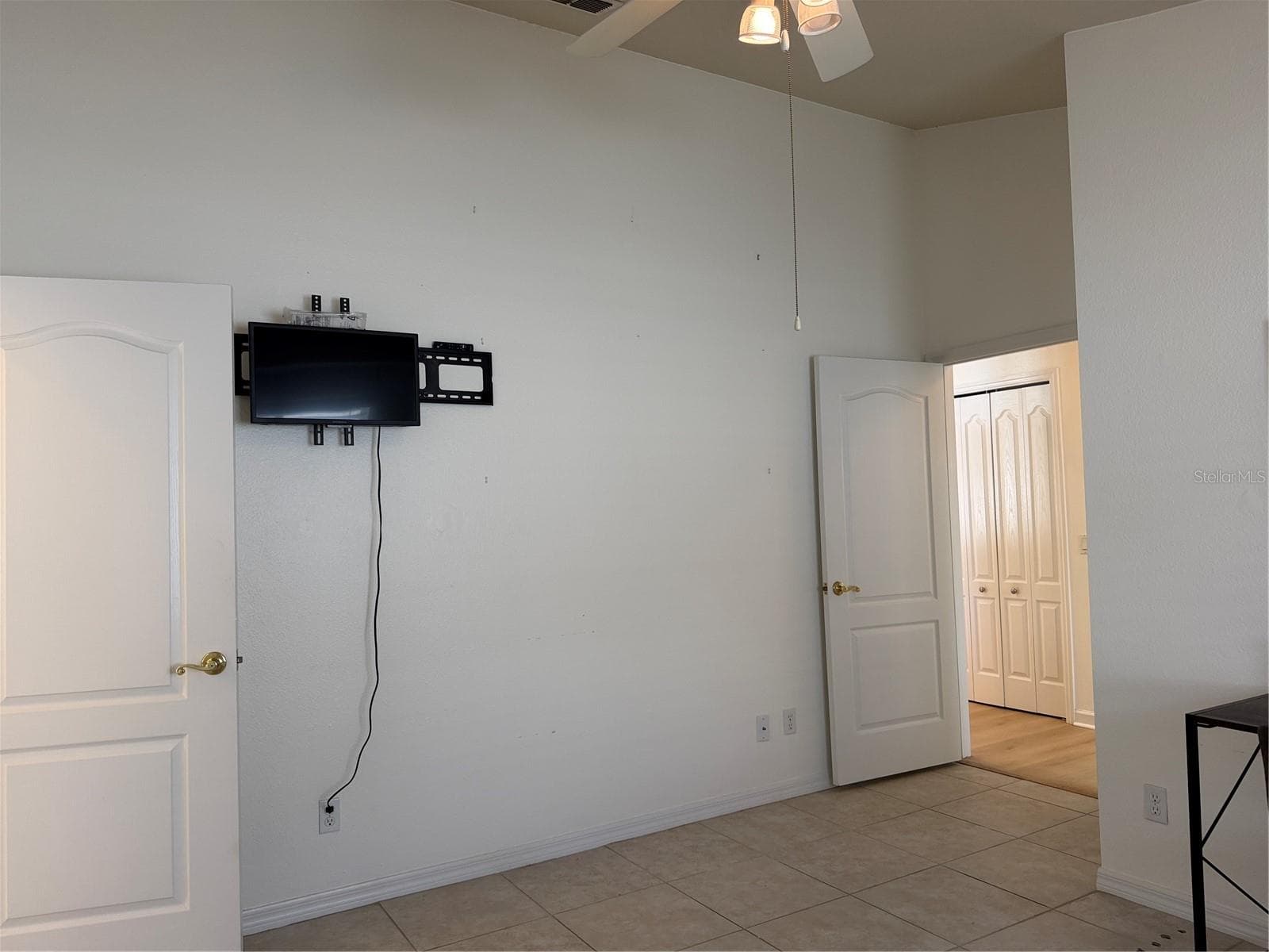 Bracket mounted to wall for flat screen TV - 2311 OASIS DR, LAND O LAKES