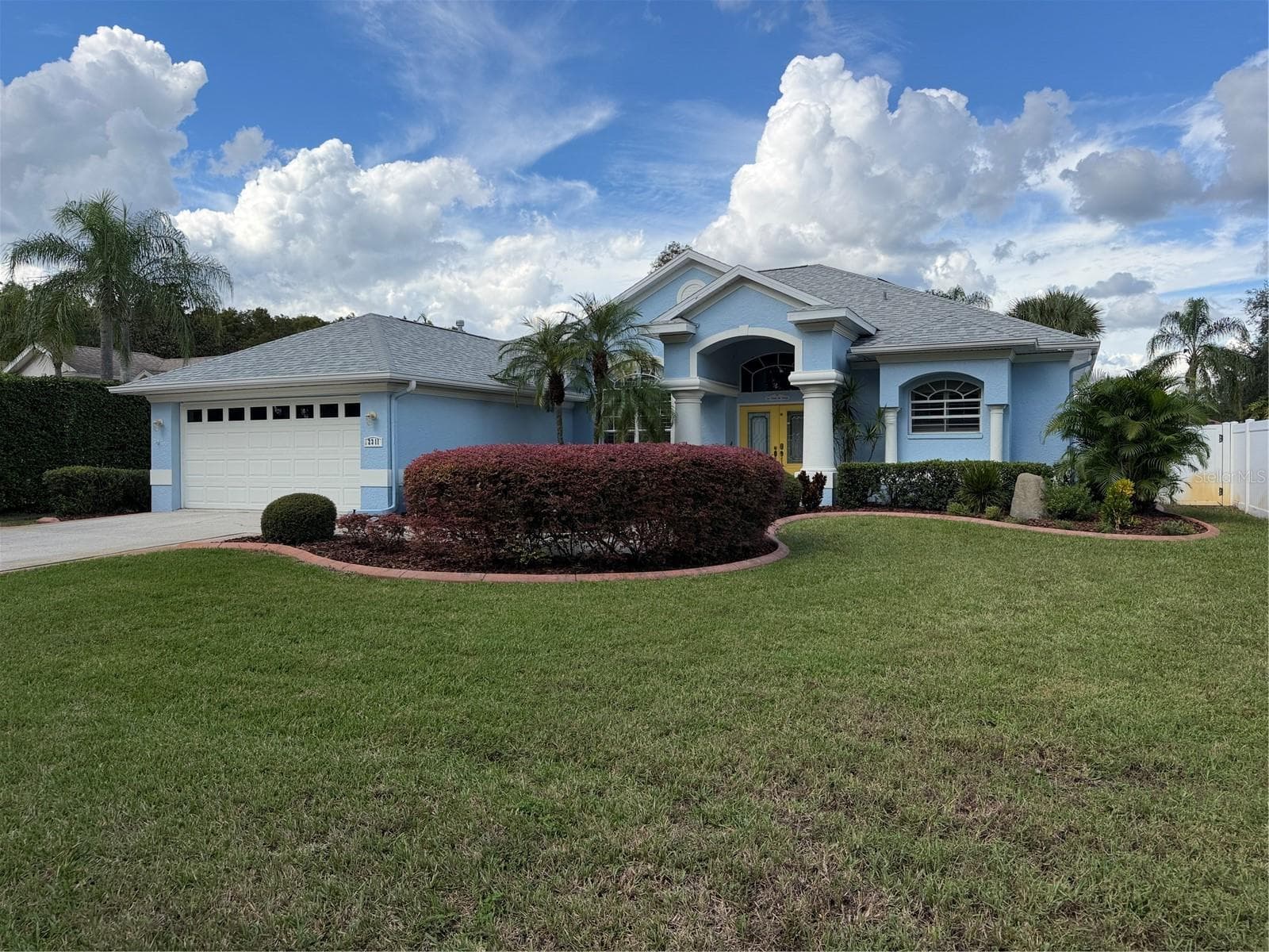 The HOA handles the mowing and edging of the front and backyard. - 2311 OASIS DR, LAND O LAKES