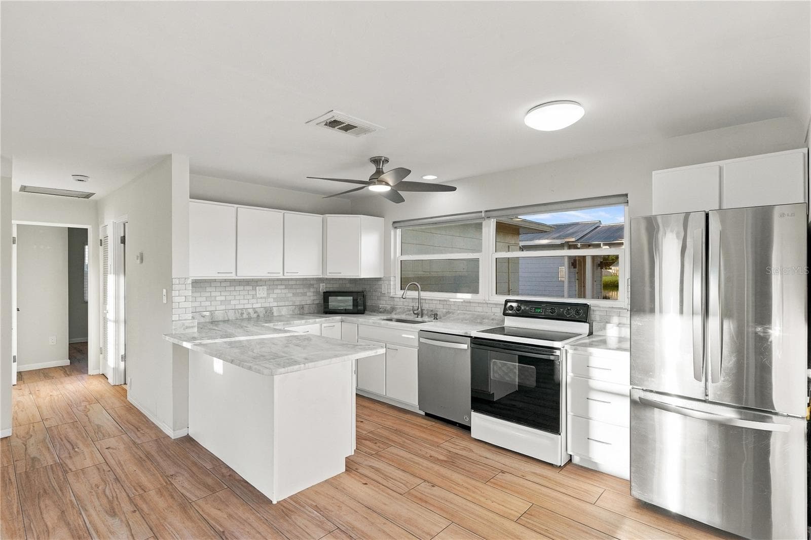 Single Family Residence at 4822 60TH WAY N, KENNETH CITY, photo 11 of 41
