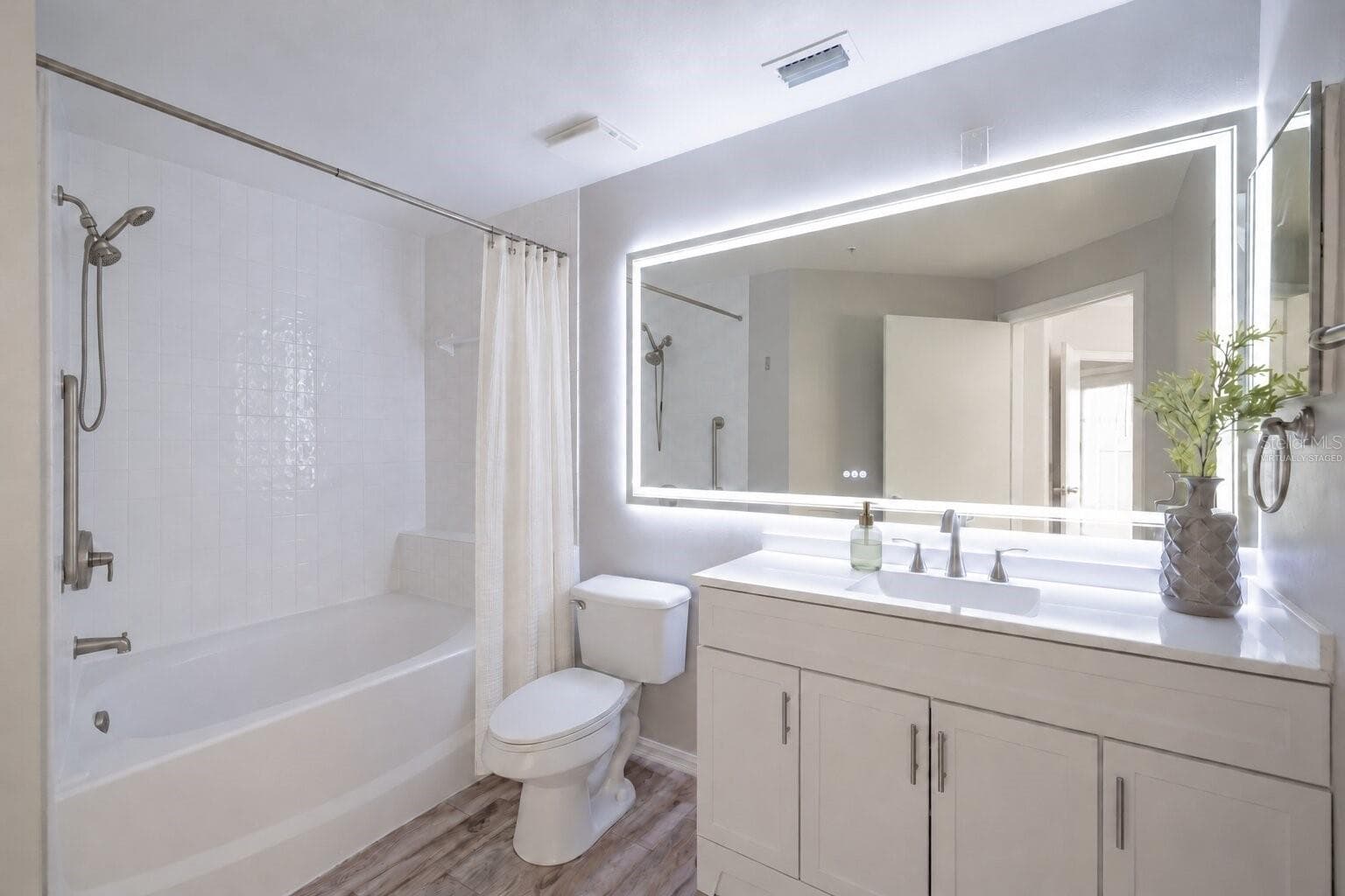 virtually staged - 5530 METROWEST BLVD #203, ORLANDO