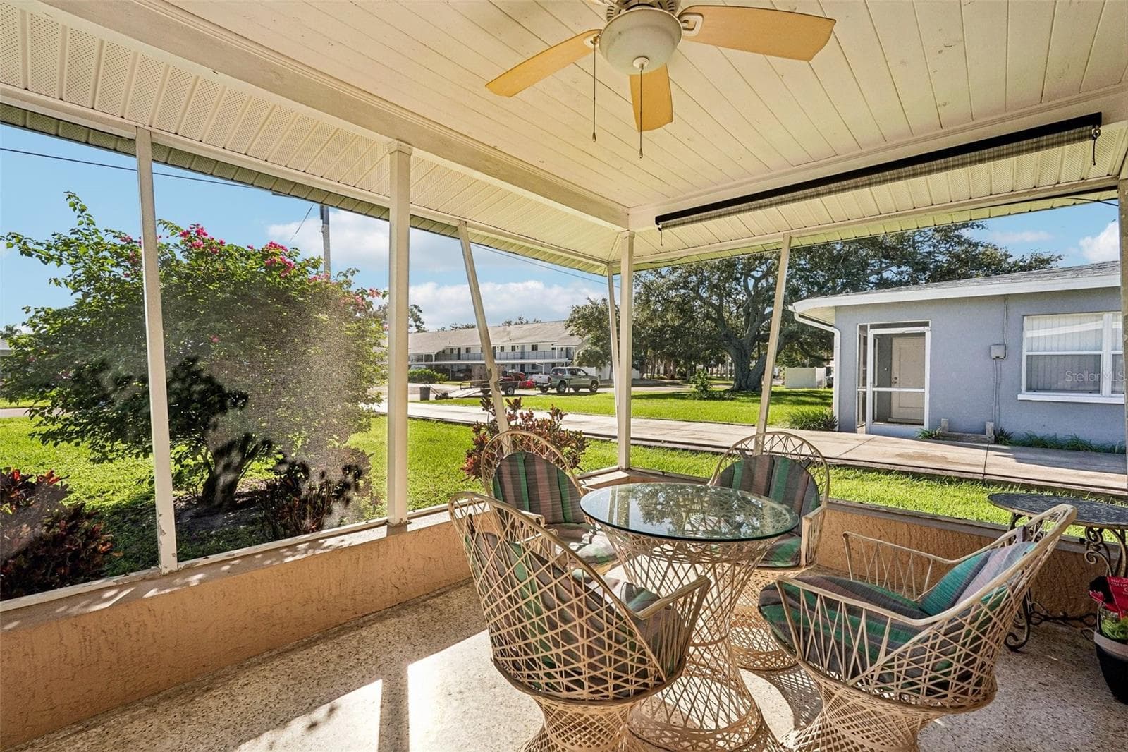 309 - Step outside your living room to the private screened lanai. - 309 PARKSIDE DR, VENICE