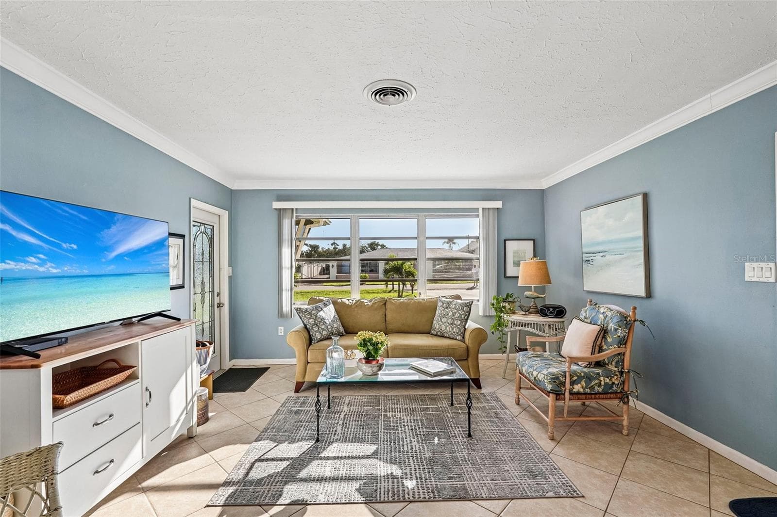 311 living room, towards lanai door - 309 PARKSIDE DR, VENICE