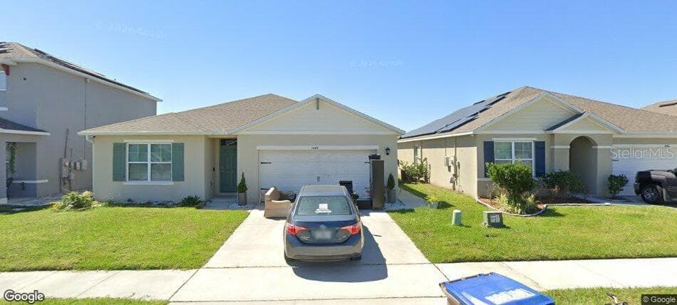 front - 1448 TAWNY RIDGE RD, KISSIMMEE