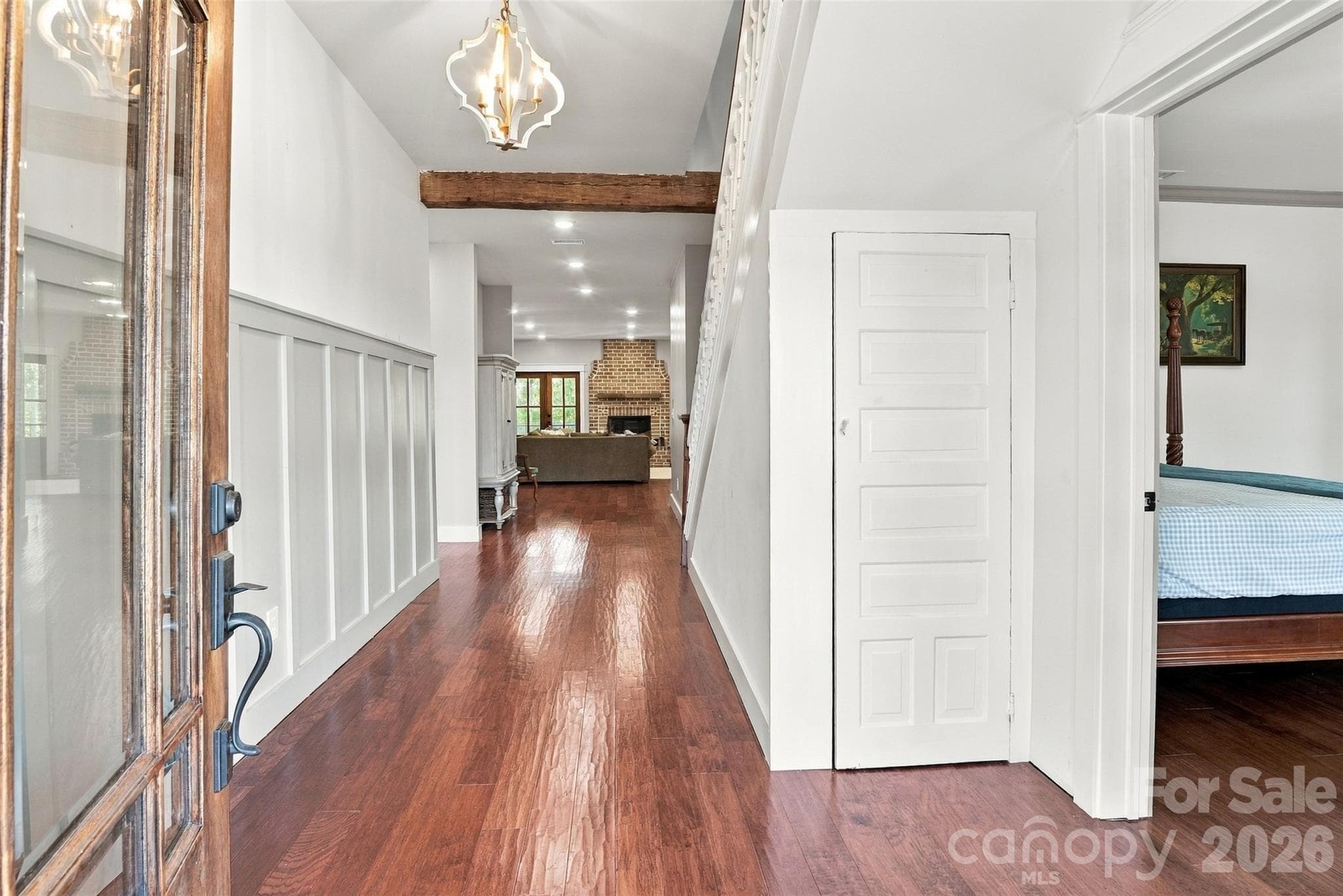 Front entrance showing the beautiful beam in ceiling and fireplace in the living room. Office to the right - 3098 Irene Bridge Highway, Hickory Grove