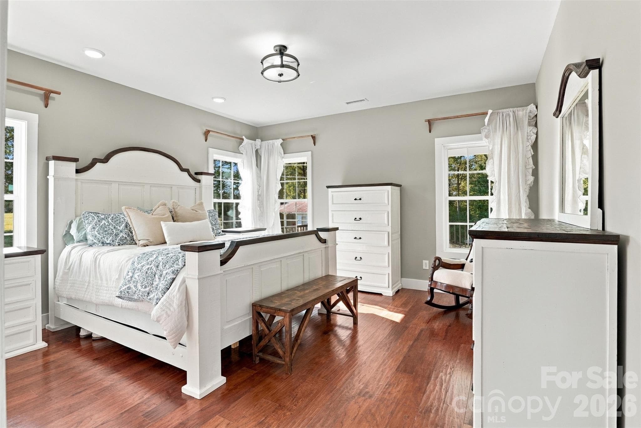 Primary bedroom on main that's flooded with natural light - 3098 Irene Bridge Highway, Hickory Grove