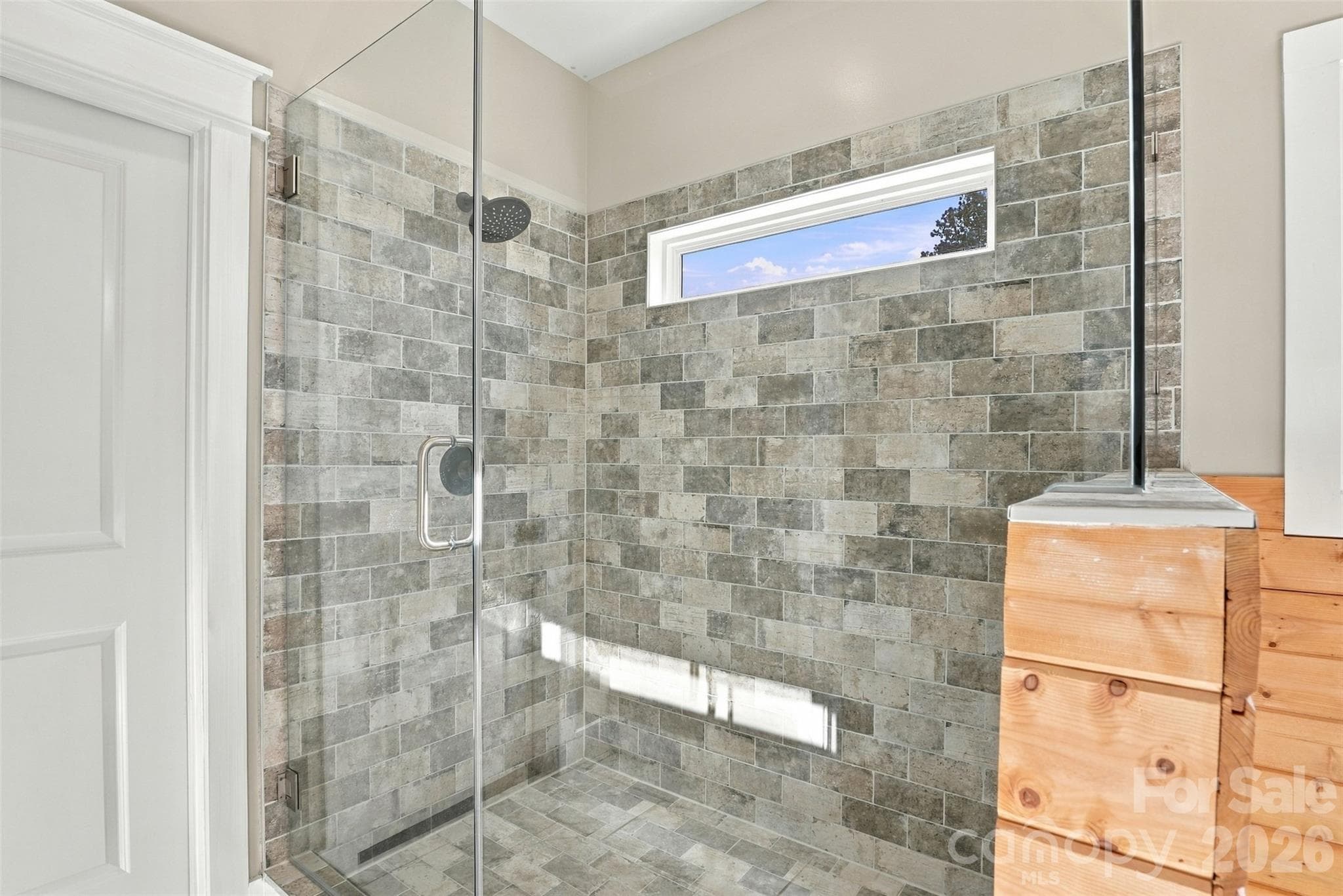 Transom window in shower creates privacy while bringing in natural light - 3098 Irene Bridge Highway, Hickory Grove