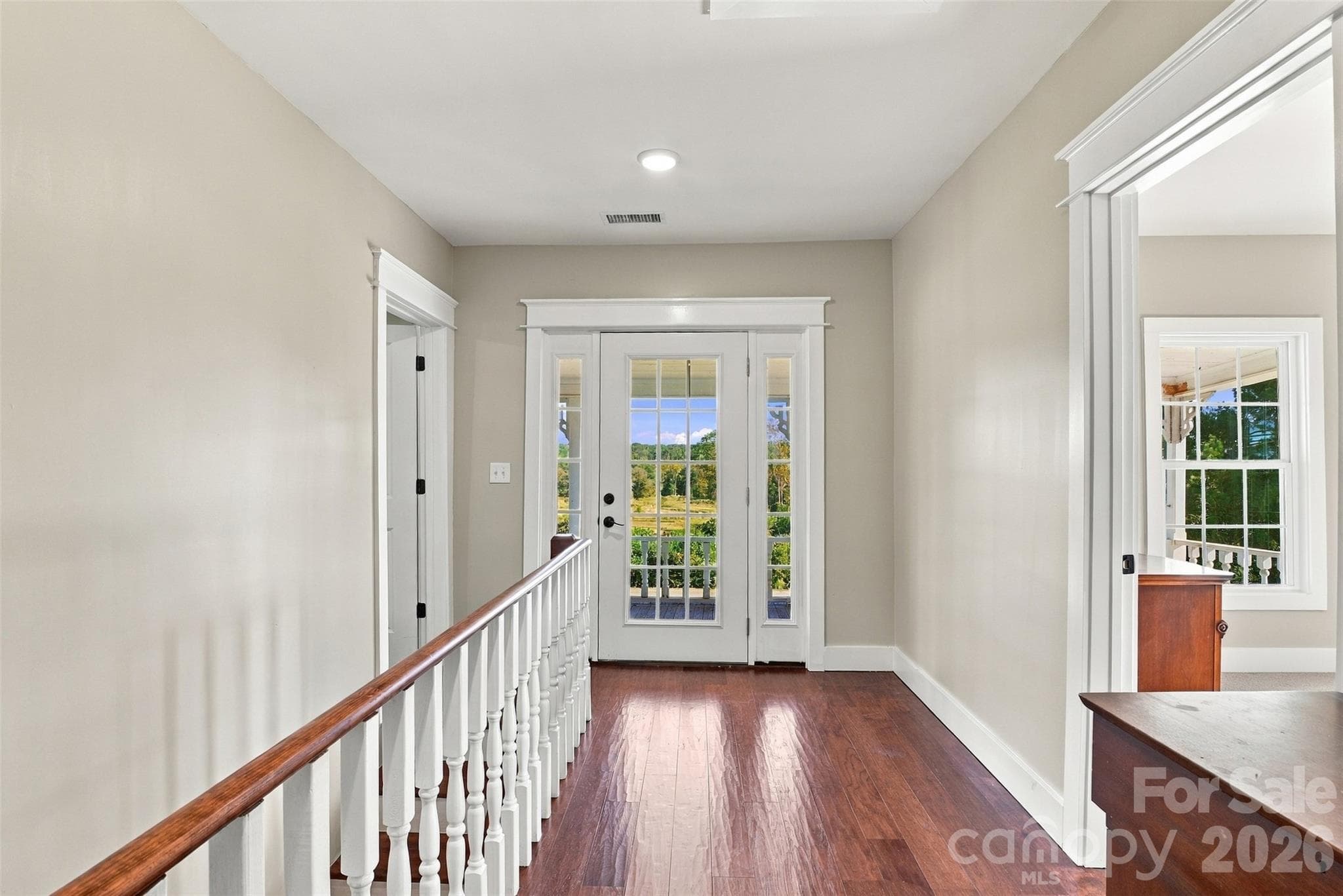 Hallway between Bedrooms #3 and #4 leading to the upper front porch - 3098 Irene Bridge Highway, Hickory Grove
