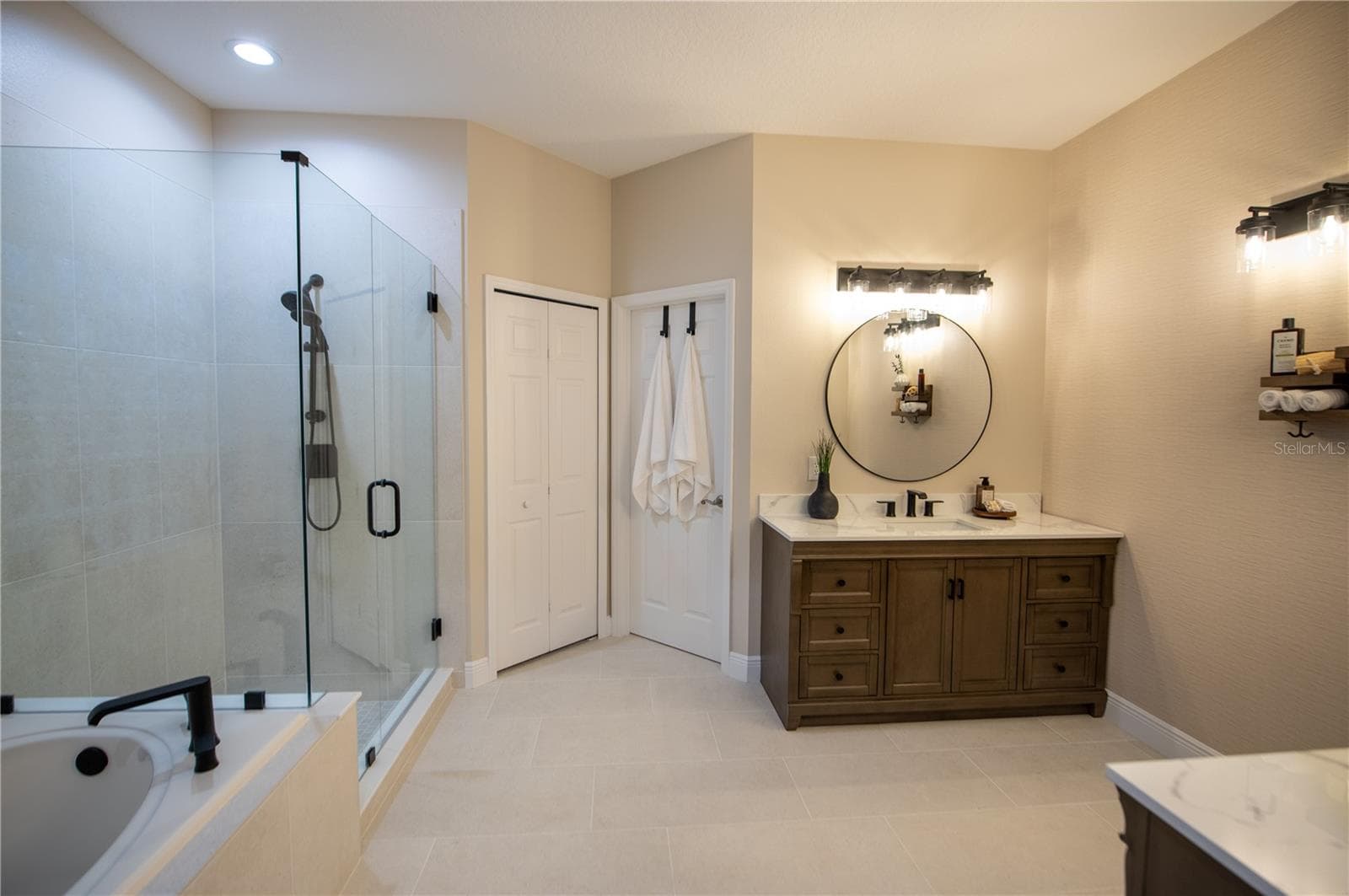 new tile & shower & duel vanities - 14038 EDEN ISLE BLVD, WINDERMERE