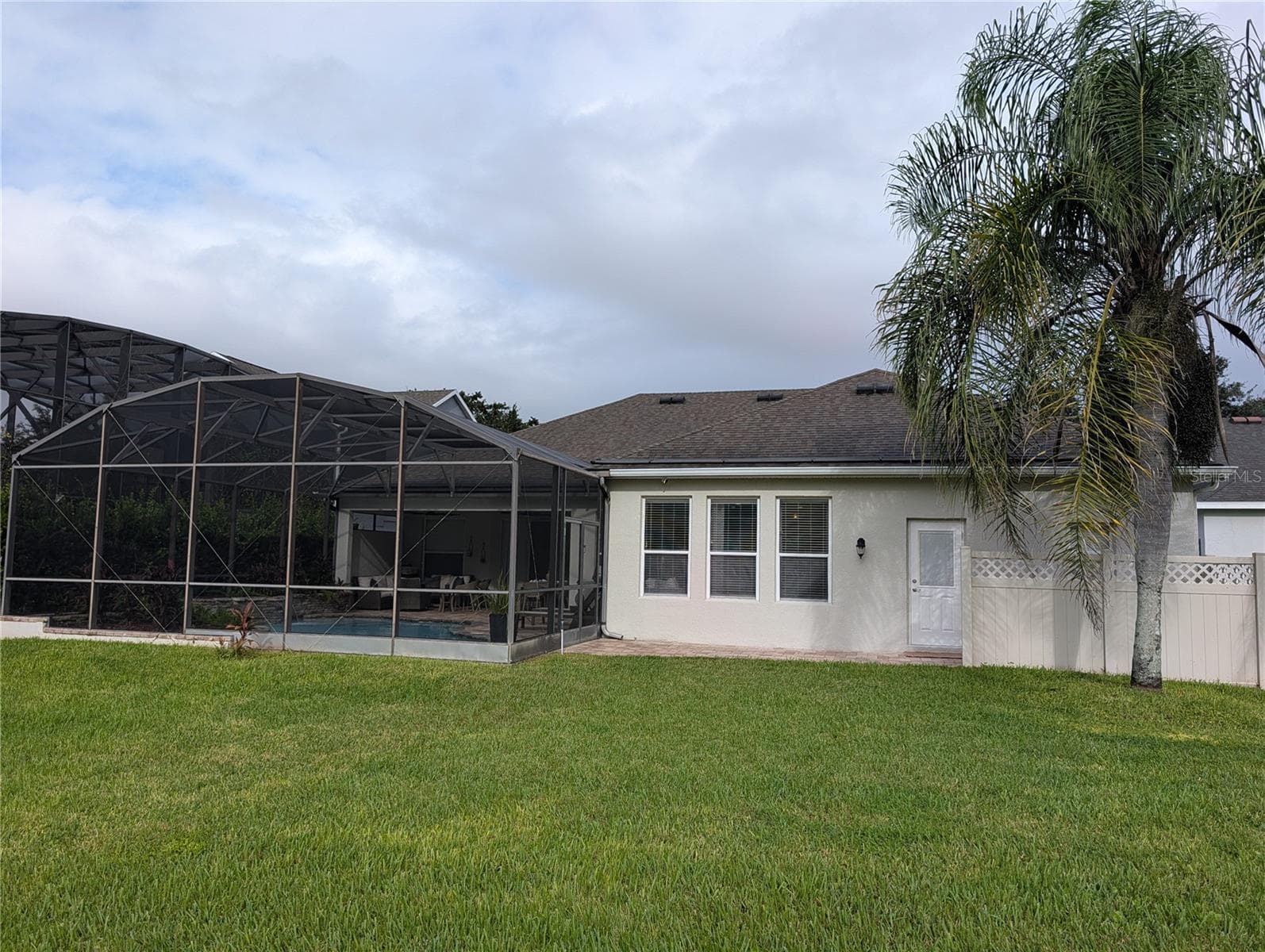 back ayrd with screened in lanai & pool - 14038 EDEN ISLE BLVD, WINDERMERE