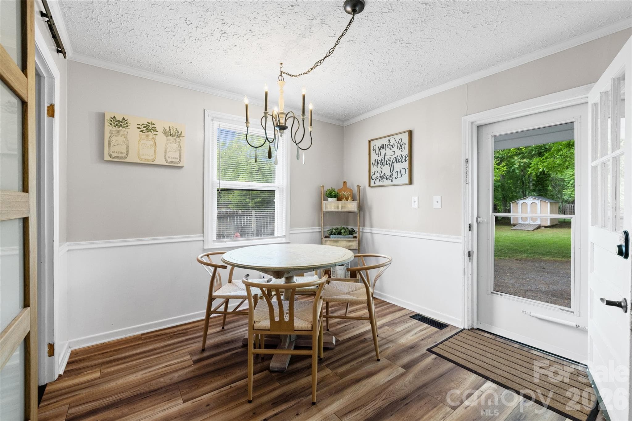 Charming dining area filled with natural light and convenient access to the backyard. - 231 E Jefferson Street, York