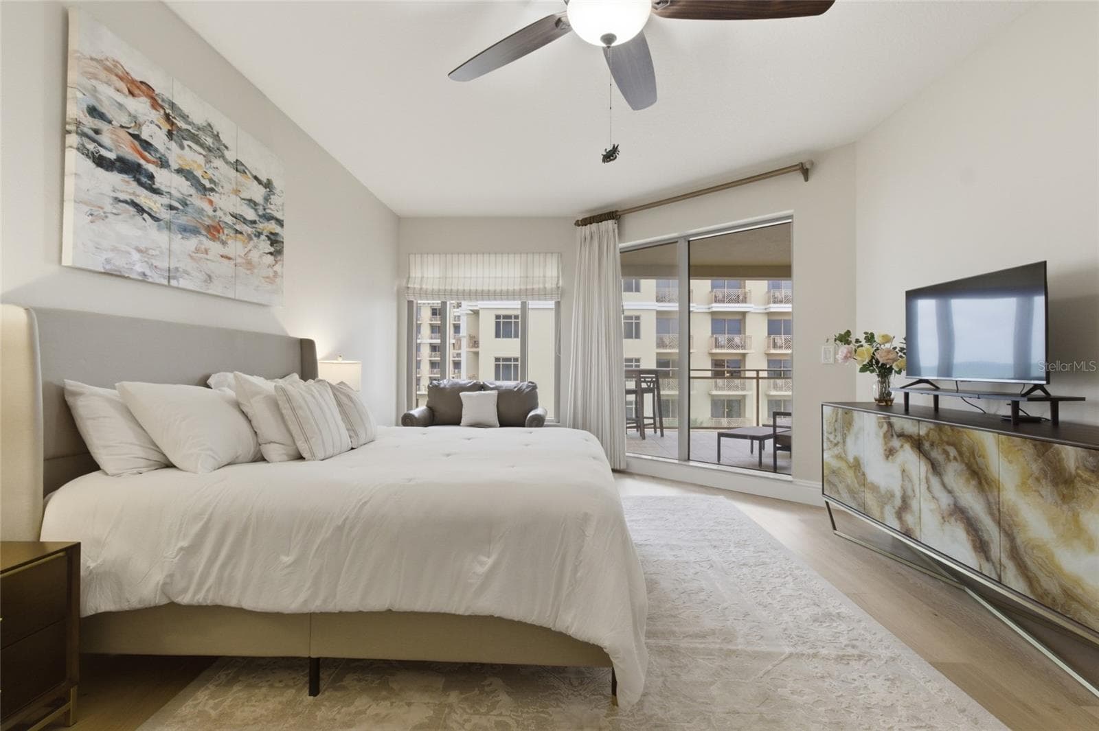 Primary bedroom has sliders to private balcony. - 11 BAYMONT ST #608, CLEARWATER BEACH