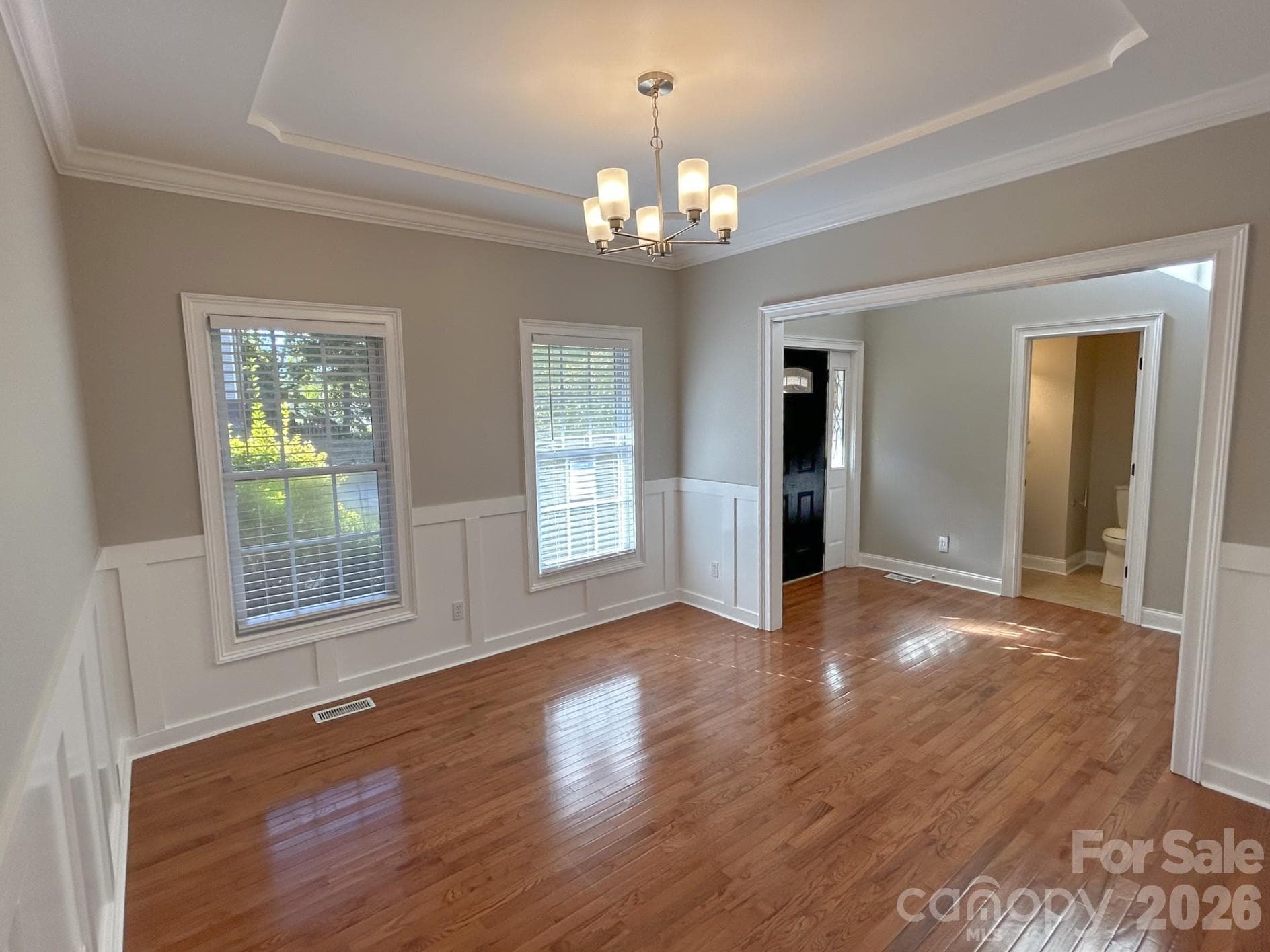 Dining Room with tray ceiling and wainscoting - 201 Colonel Holcombe Place, Candler