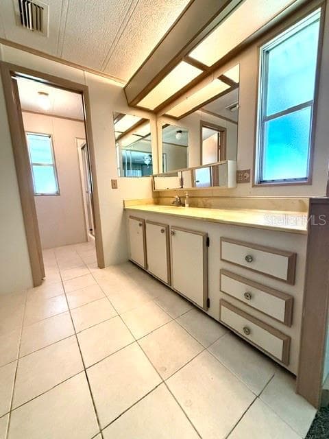 Primary bathroom vanity - 1837 COCO PLUM ST NE, PALM BAY