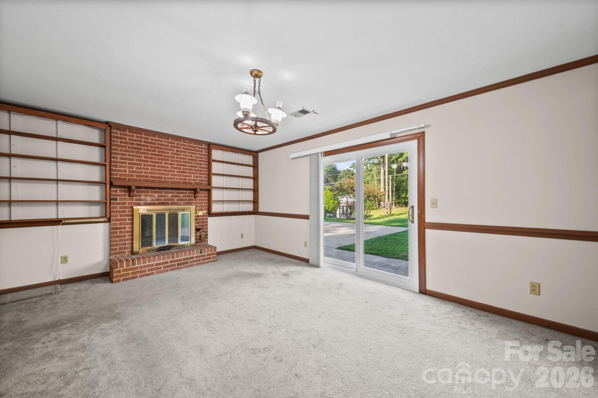 Lower level family room with fireplace - 13519 Four Oaks Lane, Matthews