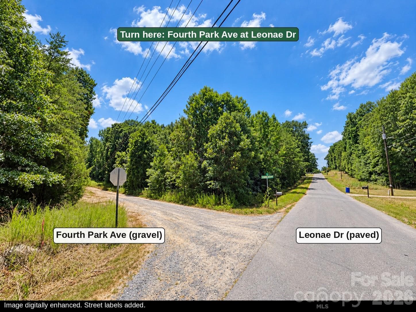 Ground view of the turn from paved Leonae Dr onto gravel Fourth Park Ave, the road to the land. Street labels added; image digitally enhanced. - 00-00 Fourth Park, Randleman